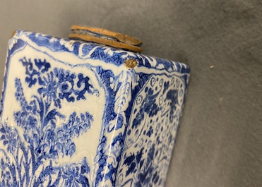 A rectangular Dutch Delft blue and white tea caddy with floral design, late 17th C.